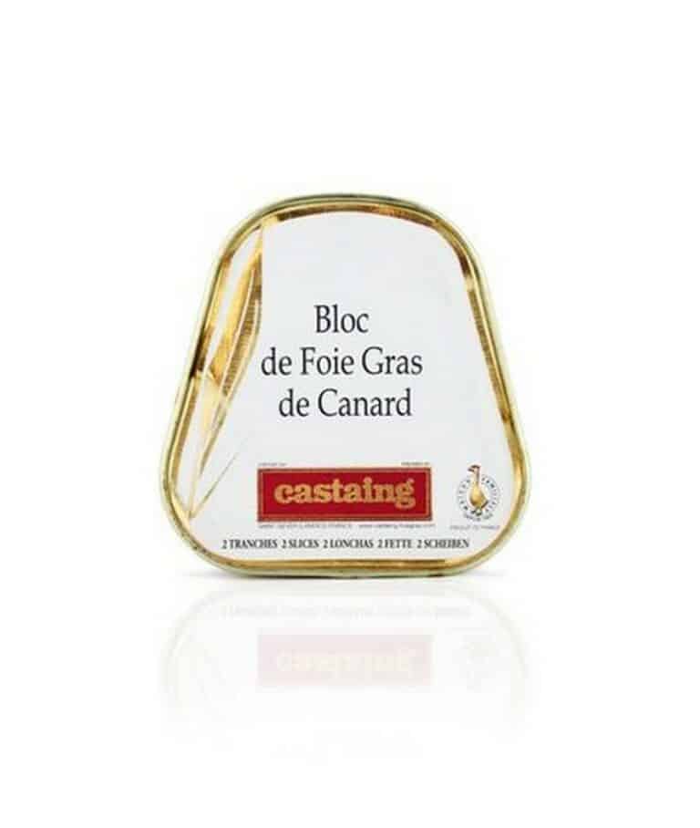 Castaing Bloc av Foie Gras de Canard 75g i en trapetsformad plåtburk, redo att serveras som en klassisk fransk delikatess.