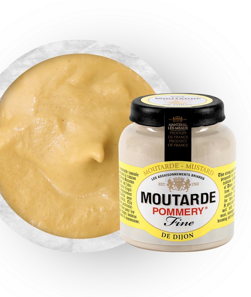 En 100g keramikburk med Pommery fransk Dijonsenap, finkornig lyxsenap med blått vaxsigill i en köksmiljö.