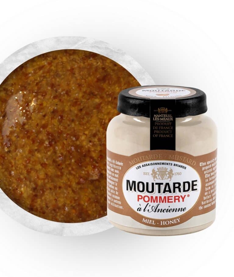 En 100g keramikburk med Pommery fransk senap med honung, förseglad med gult vaxsigill på ett rustikt träbord.