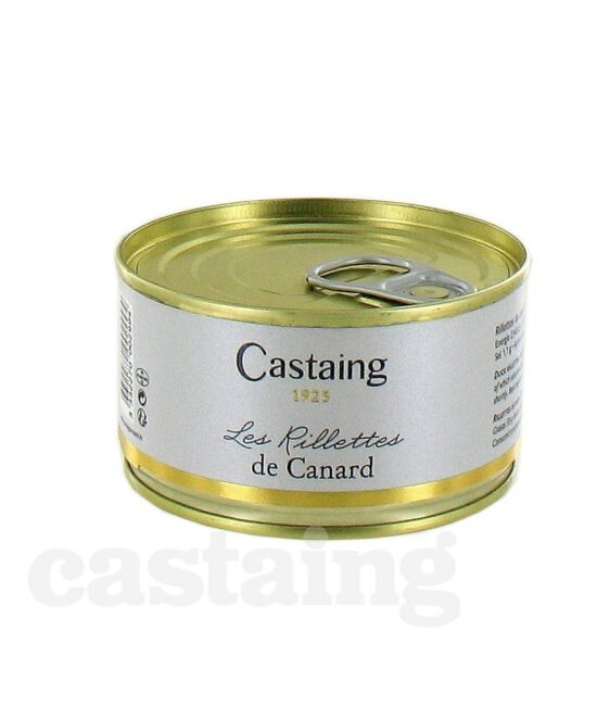 Burken med Castaing Rillettes de Canard 130g, placerad bredvid en skiva lantbröd och en liten skål med cornichons.