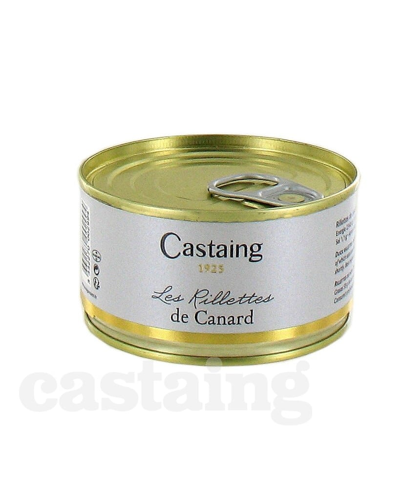 Burken med Castaing Rillettes de Canard 130g, placerad bredvid en skiva lantbröd och en liten skål med cornichons.